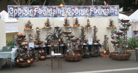 Here is what my booth looks like. You can see my copper water fountains range in size from desktop size to 7' tall. Here is what my booth looks like. You can see my copper water fountains range in size from desktop size to 7' tall.